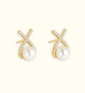 Elegant Korean studded cross pearl stud earrings in gold plating, showcasing a stylish Western design for women.