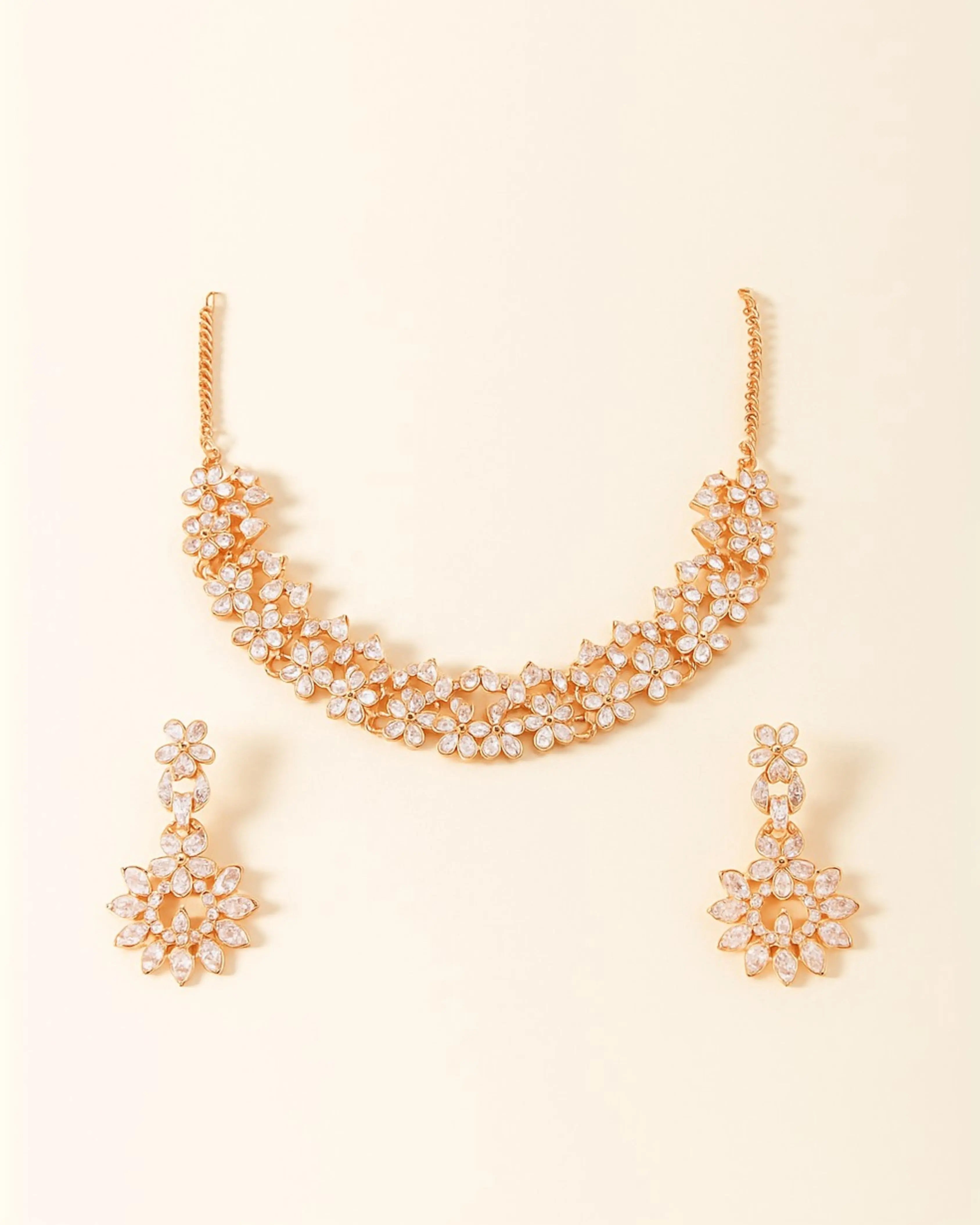 Elegant gold-plated Austrian Diamond Jewellery Set for women, featuring a sparkling necklace, earrings, and ring.