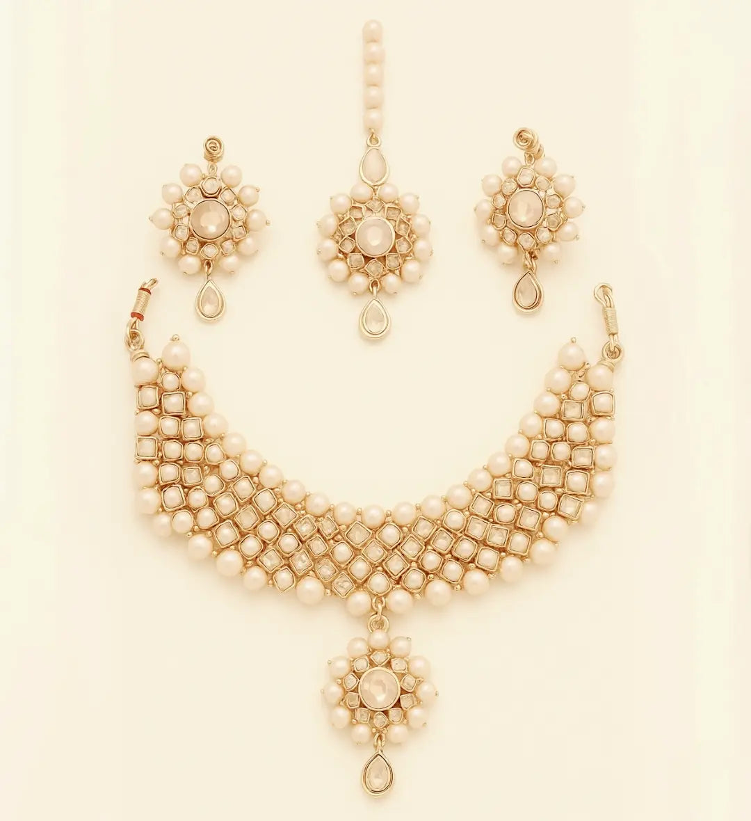 Elegant Golden Harmony Jewelry Set featuring a shimmering gold-plated necklace, earrings, and ring for women by AlinKriti.
