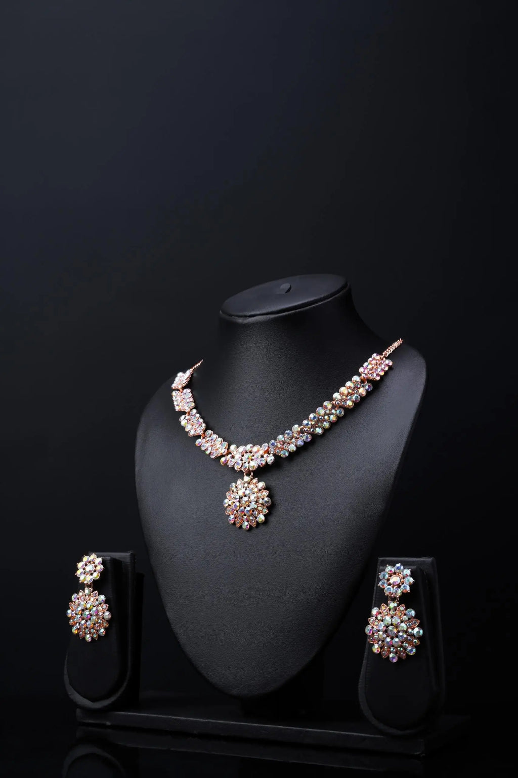 Elegant gold-plated Austrian Diamond Jewellery Set for women, featuring a sparkling necklace, earrings, and ring.