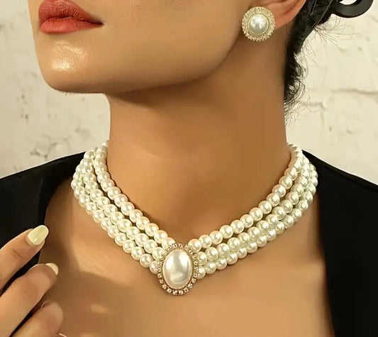 Elegant gold-plated artificial pearl necklace for women, showcasing a delicate beaded design for a chic, timeless look.
