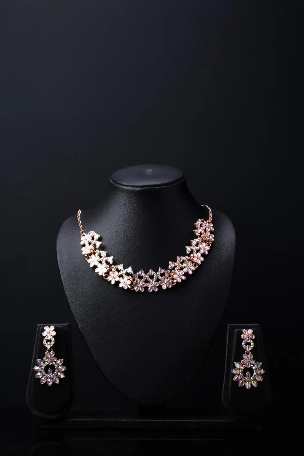 Elegant gold-plated Austrian Diamond Jewellery Set for women, featuring a sparkling necklace, earrings, and ring.
