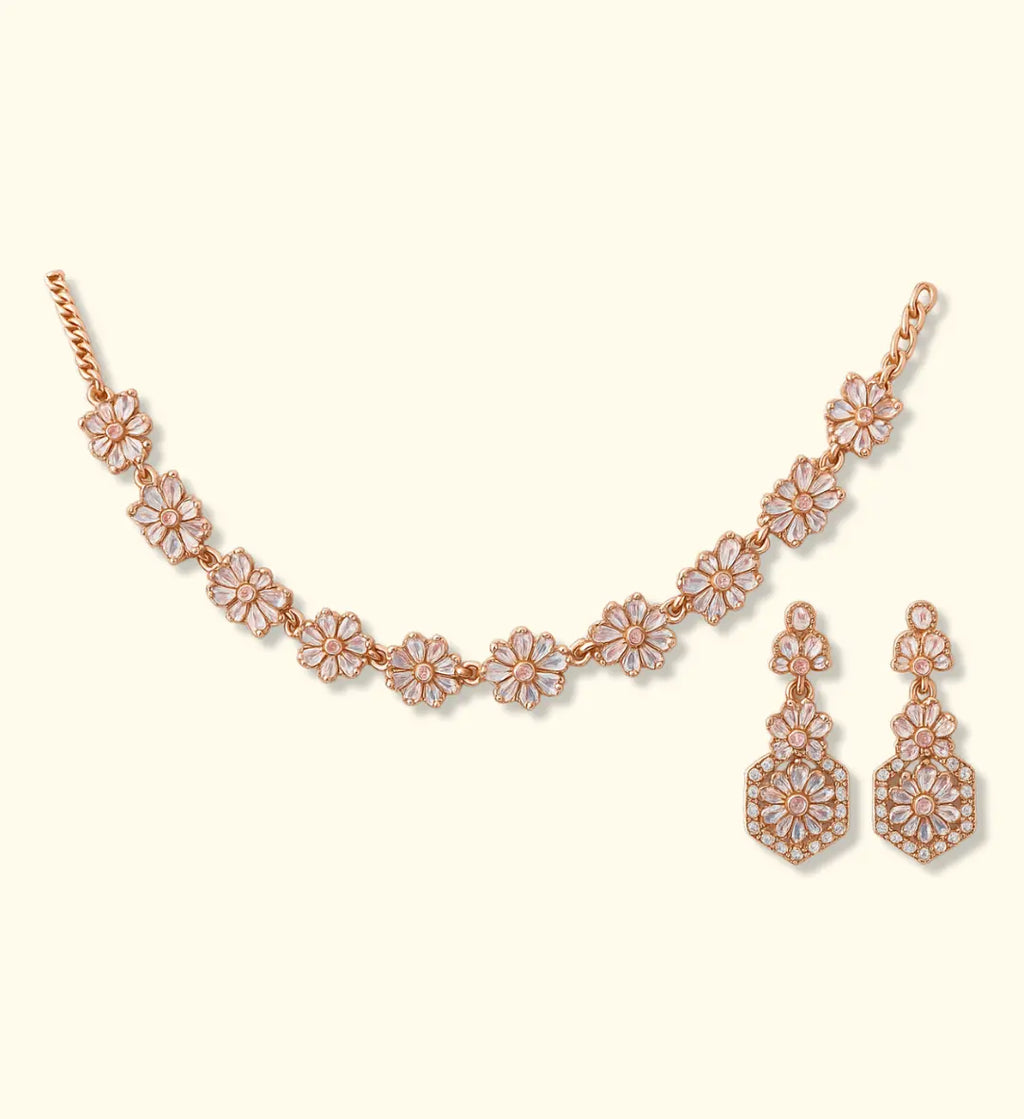Elegant gold-plated Austrian Diamond Jewellery Set for women, featuring a sparkling necklace, earrings, and ring.