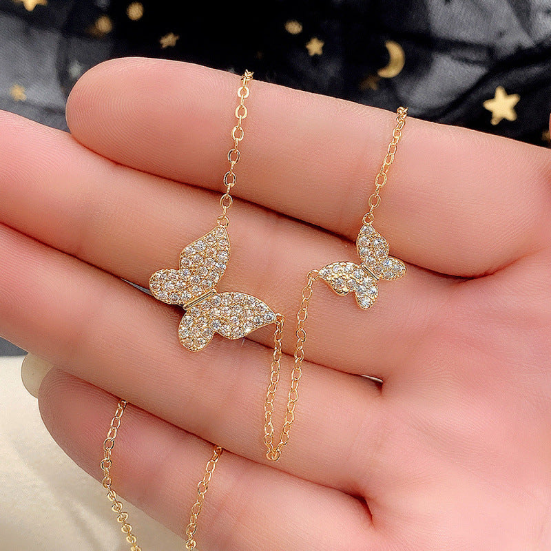 Crystal butterfly necklace gold