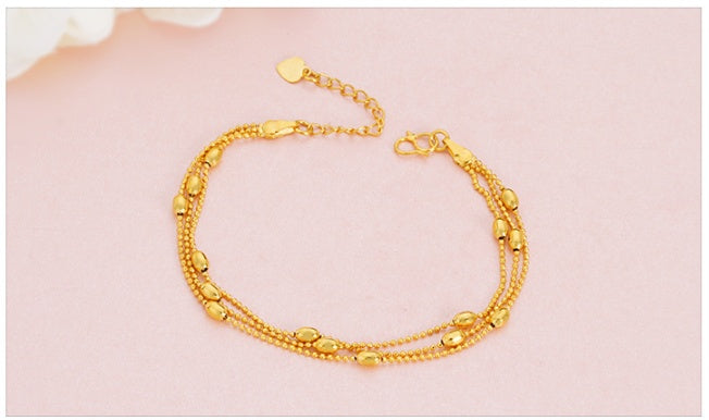 Gold tone brass bracelet for women